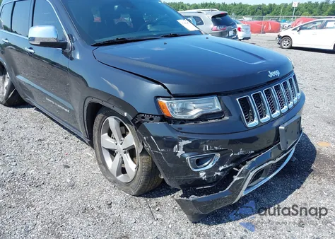 2014 Jeep Grand Cherokee Overland z USA, uszkodzony, nr VIN 1C4RJFCT5EC302709